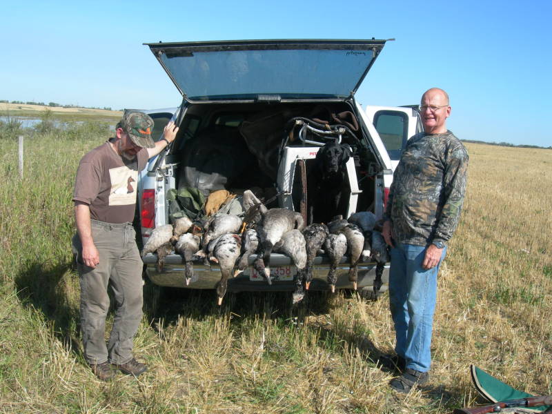 Bob and Jim Beck with birds.