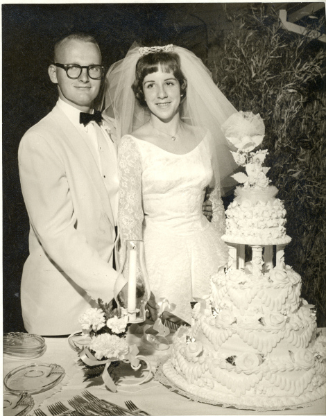 Barb and Jim Cutting Wedding Cake