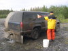 Washing the car on the Dempster Hwy.