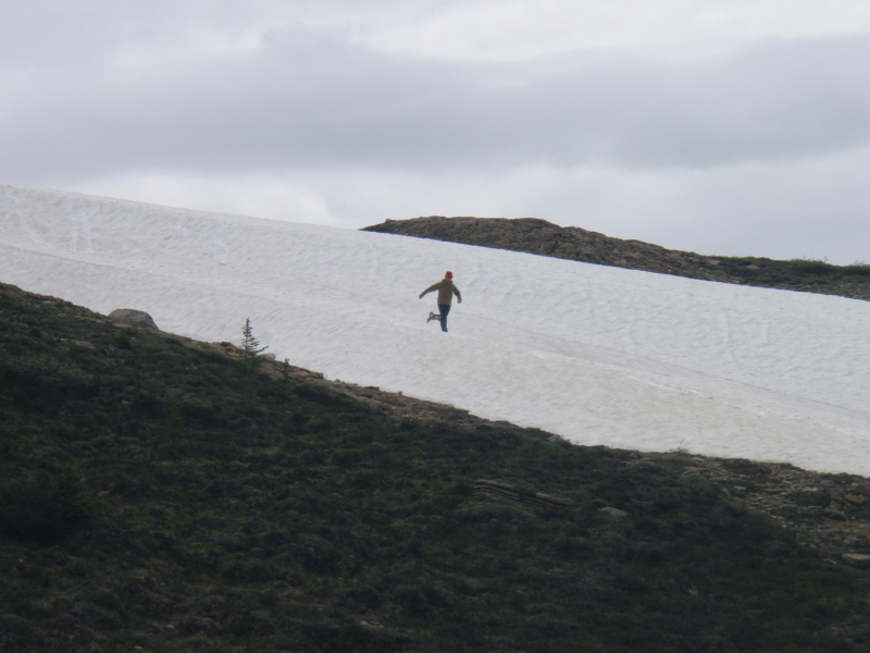 Andy comes flying down a snow patch